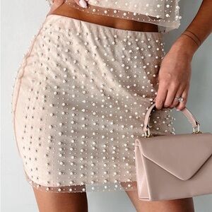 Shimmer and slay rhinestone and pearl skirt.